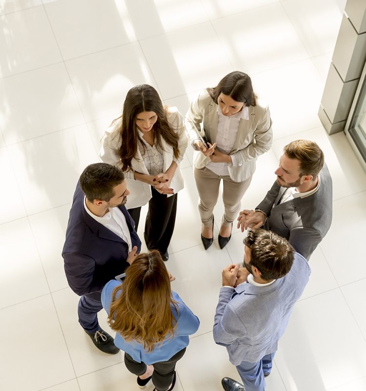 Overhead view of people having business meeting
